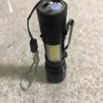 NEVERDIE Mini Lanterna Militar Tática Com Led Forte e Zoom p/ regular Alcance Recarrega via USB photo review