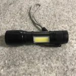 NEVERDIE Mini Lanterna Militar Tática Com Led Forte e Zoom p/ regular Alcance Recarrega via USB photo review